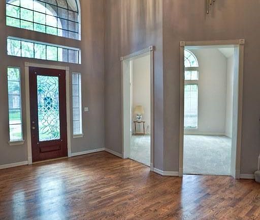 Great entry with high ceiling and wood floors