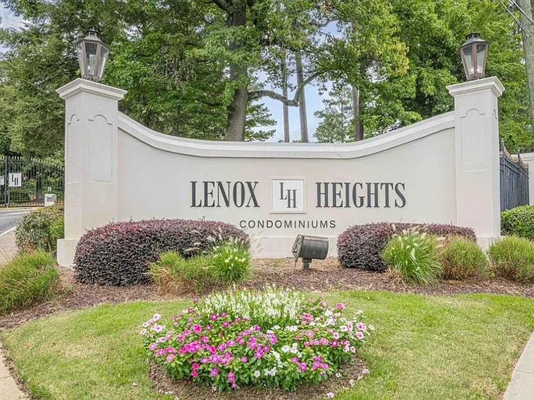 Community sign with a lawn