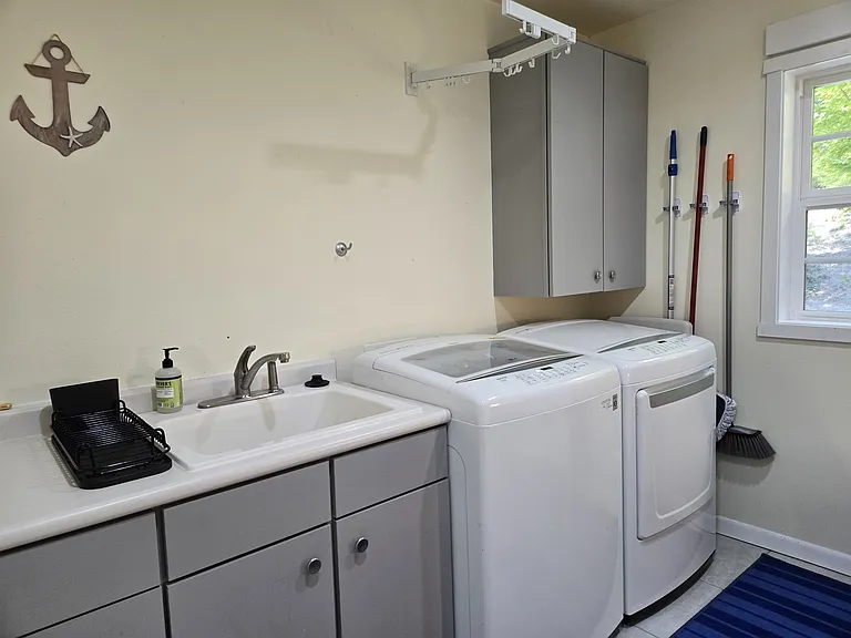 Laundry room with washer and dryer
