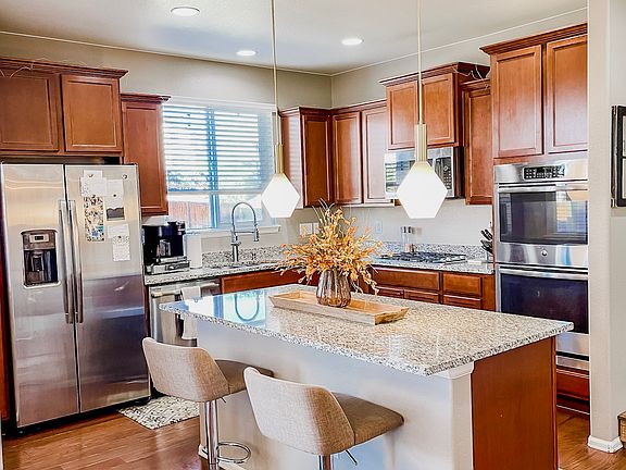 Granite Countertops, Lots of Cabinets plus Pantry