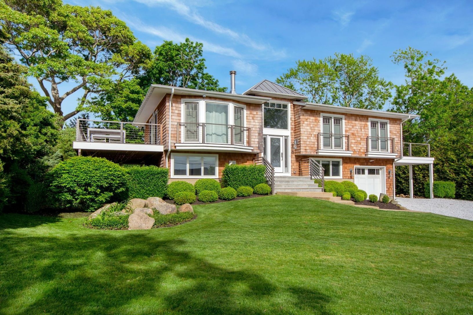  Located in desirable Bay Point community of Sag Harbor, directly across from Long Beach