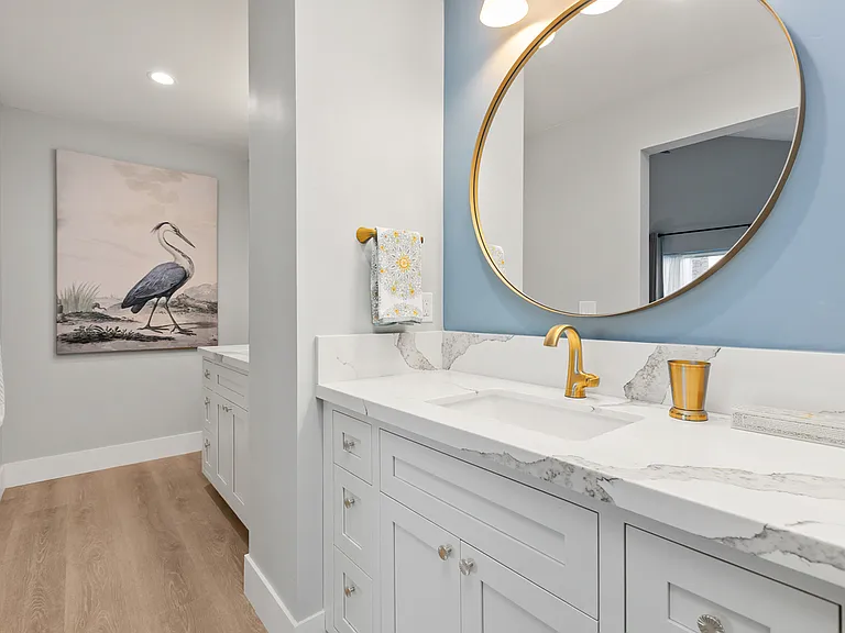 Upstairs bath has dual vanities