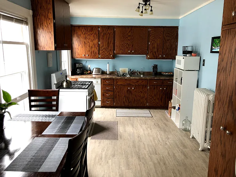 Kitchen - new cabinets, updated oven/stove, refrigerator, and dishwasher