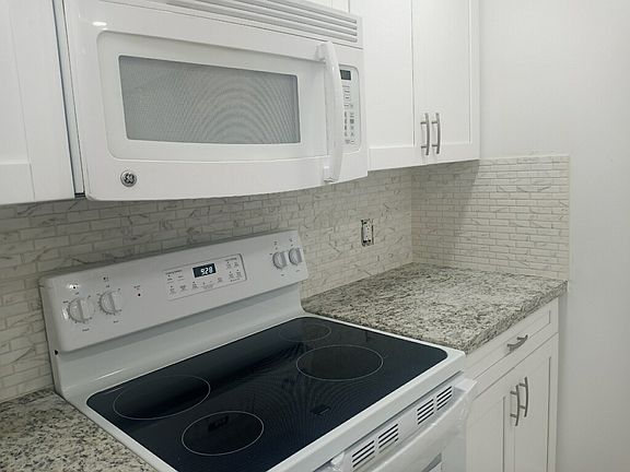 2nd image of 4221 W Palm Aire Dr APT 205