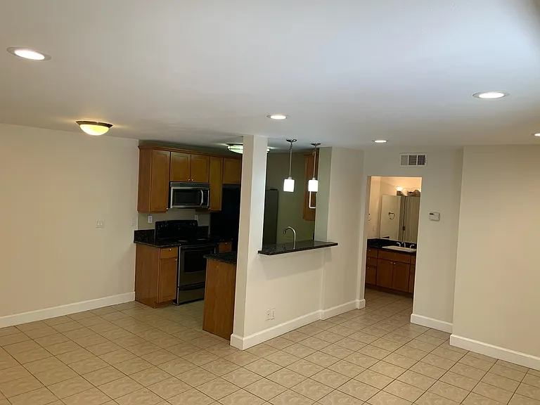 Living room and kitchen from patio door view