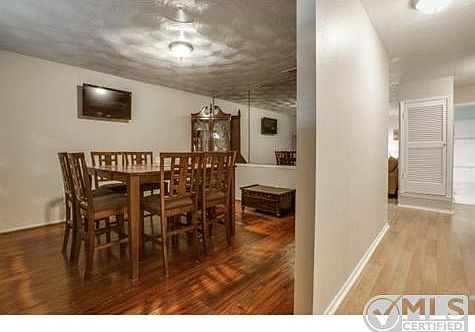 Upon entry, looking into the formal dining or living space and i