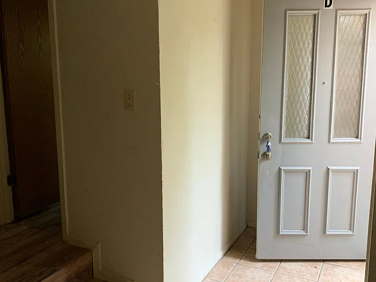 Entry and stairs to half bath