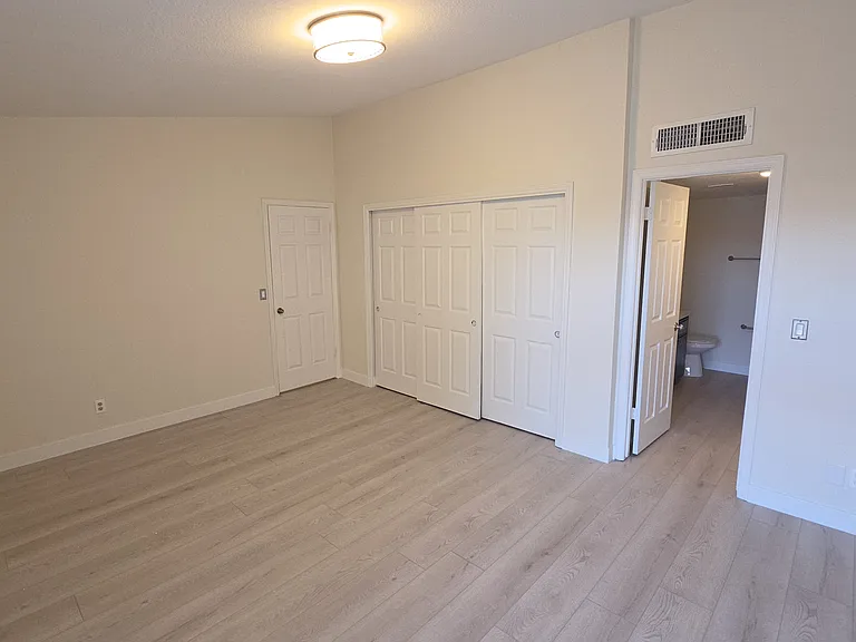 Large Master Bedroom with high ceilings