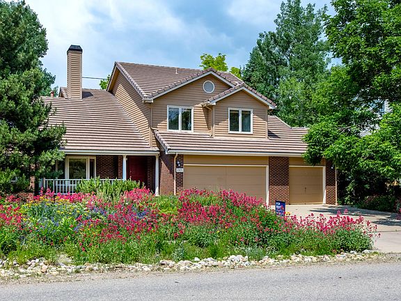 Beautiful gardens & front porch