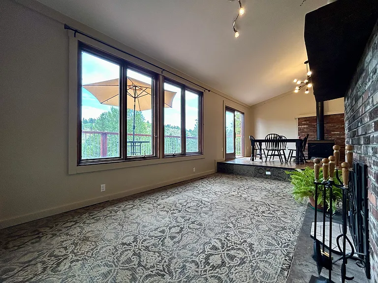 7 foot picture windows inviting the outdoors in