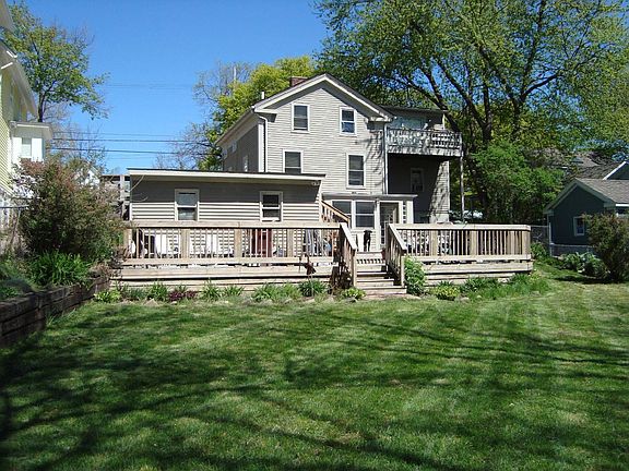 Rear - 3 stories + deck and shed