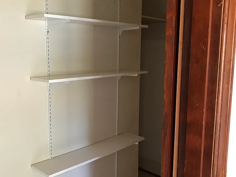 Upstairs west bedroom walk in closet