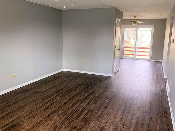 Living Room towards dining area and deck