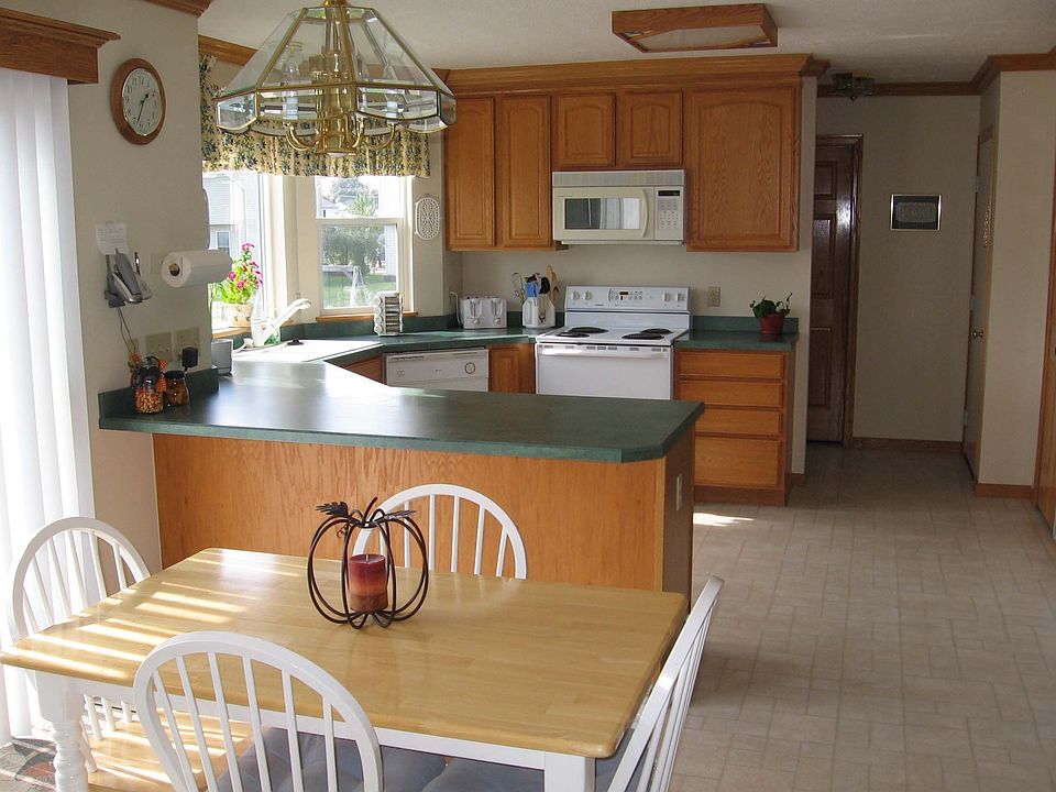 Large open kitchen with plenty of cabinets and great woodwork!