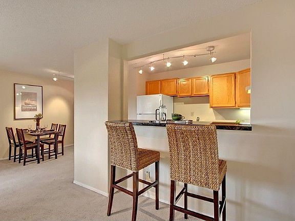 Seller updated the Kitchen by opening up this wall and creating an Eating Bar.