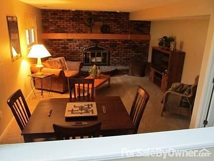 Family Room
						:
						Wall to wall brick fireplace.