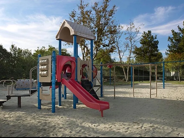 Park, playground, party shelter, and basketball court 1 block from home.
