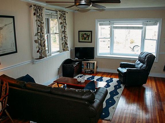 Living area with hardwood floors and lots of light