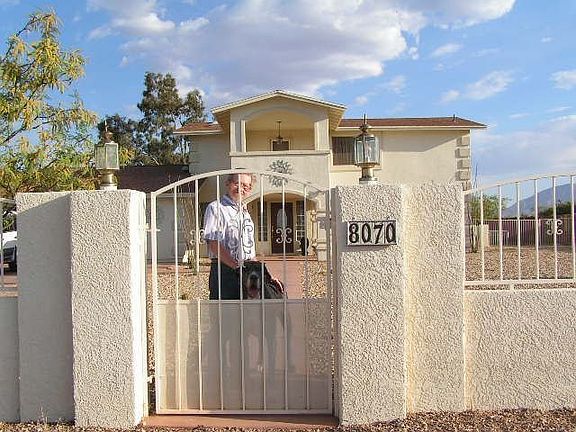 Beautiful front gates and up to 9 course wall