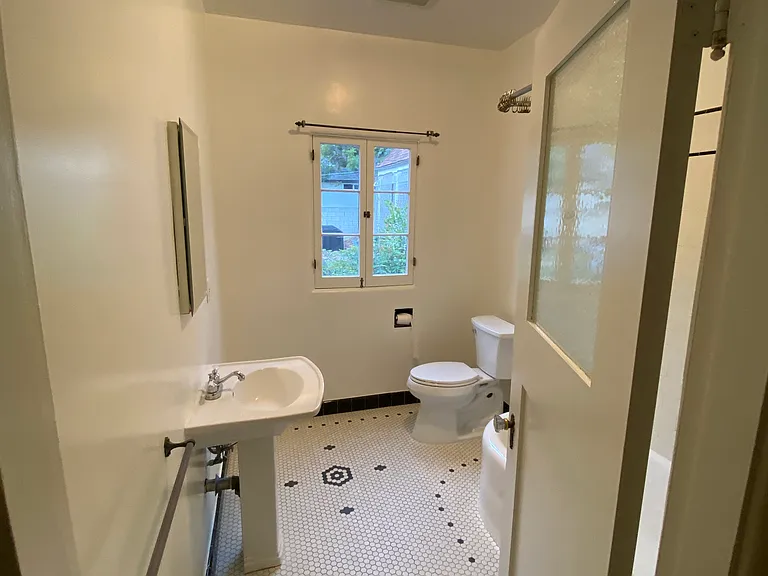 RESTORED 1920S FULL BATHROOM WITH CERAMIC TILE FLOORING