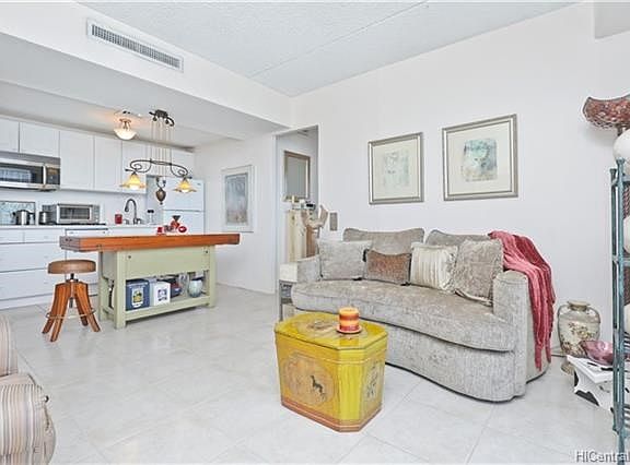 From living room looking back to open kitchen for chef and entertaining.