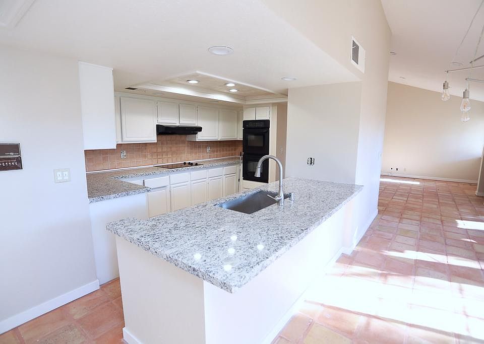 New countertops, dishwasher and refrigerator. Gas stove top, double oven.
