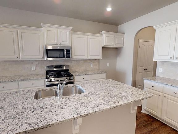 This open concept kitchen is great for entertaining or preparing that family meal.