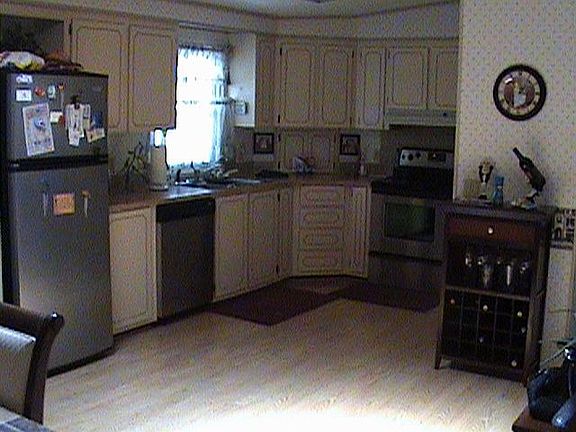 Kitchen has stainless steel appliances