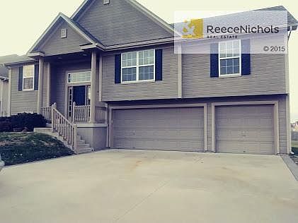 4 BDRM 3 BATH  OPEN KITCHEN TO LIVING ROOM FINISHED BASEMENT OVERSIZED THREE CAR GARAGE
