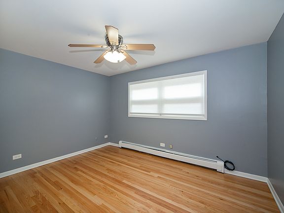 5th image of 6166 N Melvina Ave