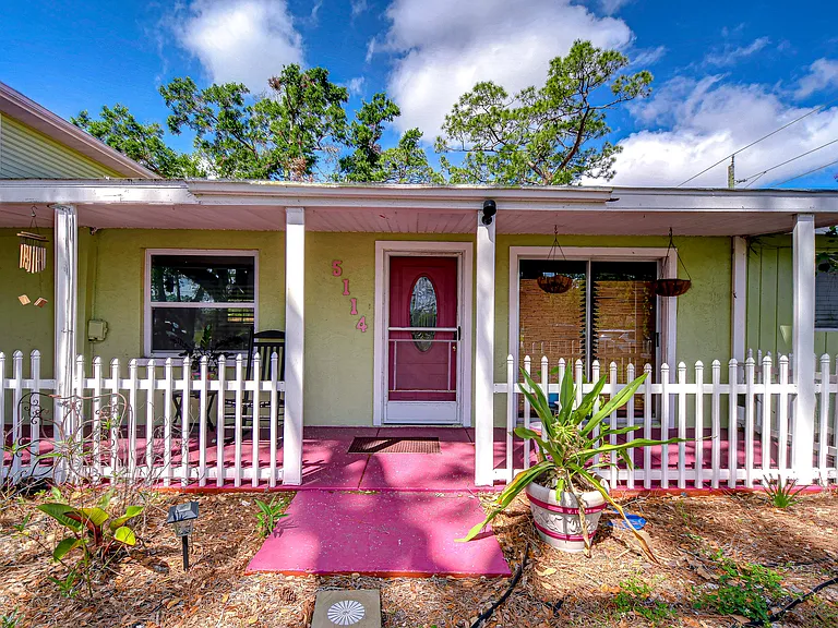 The dedicated front porch is just for the Lazy Manatee Unit which is a downstairs first floor apartment