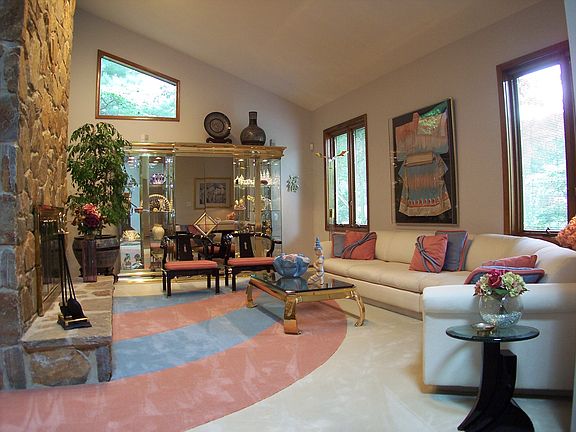 Spacious Front LR with stunning stone Fireplace