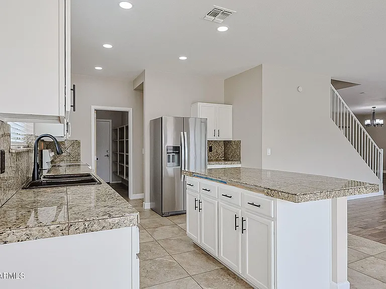 15569 W Gelding Dr — Photo 13