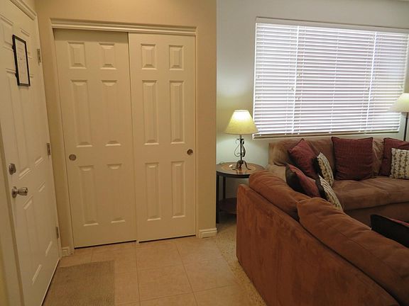 Closet at entry door leading into living room