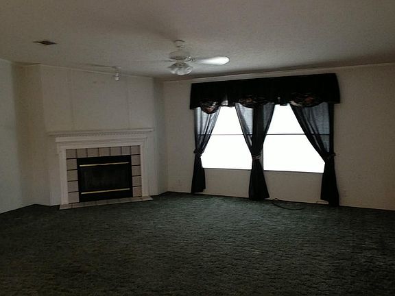  LARGE DEN WITH WOODBURNING FIREPLACE