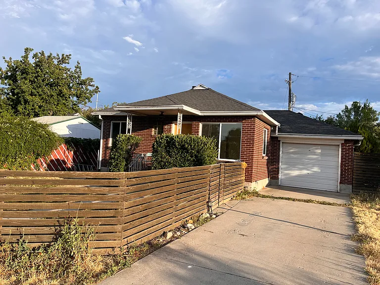 Attached garage and long driveway