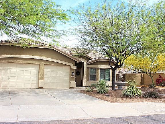 THREE car garage w/cabinets