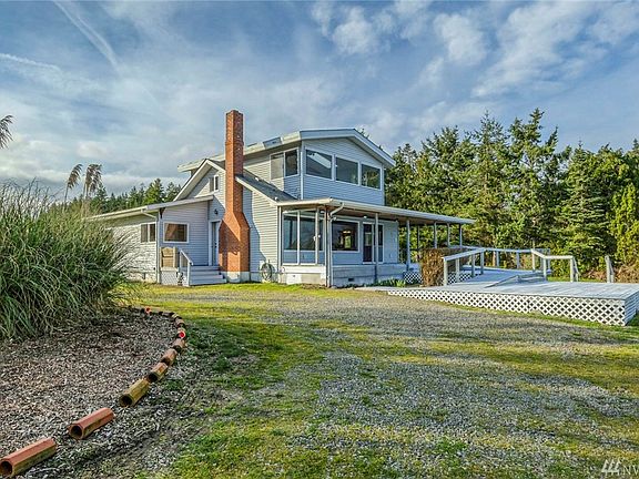 Welcome home.  The large windows bring in lots of light and frame the magnificent views.