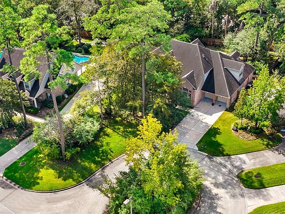 Expansive front yard in cul de sac offers a serene setting -