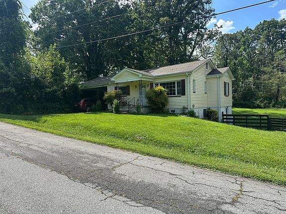 Small front yard and large fenced-in back yard.