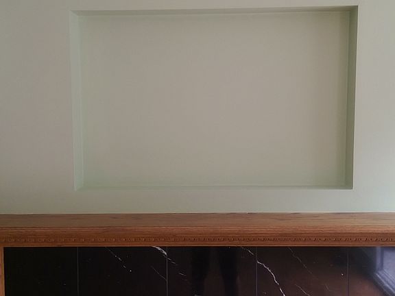 Cozy fire place, crown molding