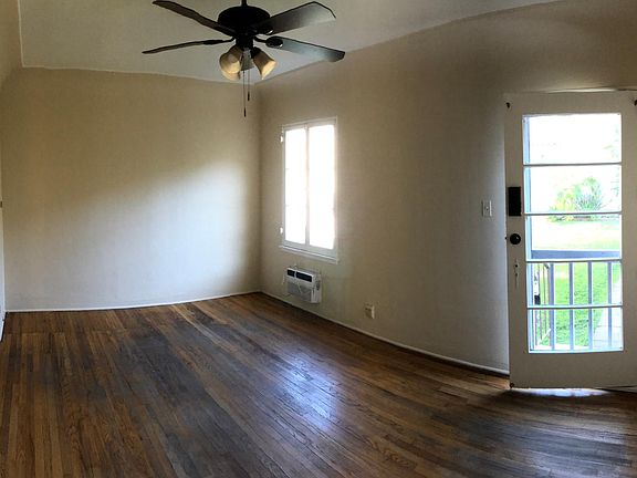 hardwood floors, wall A/C, new ceiling fan, 150 SQ room, high ceilings, wall color buttercream frosting