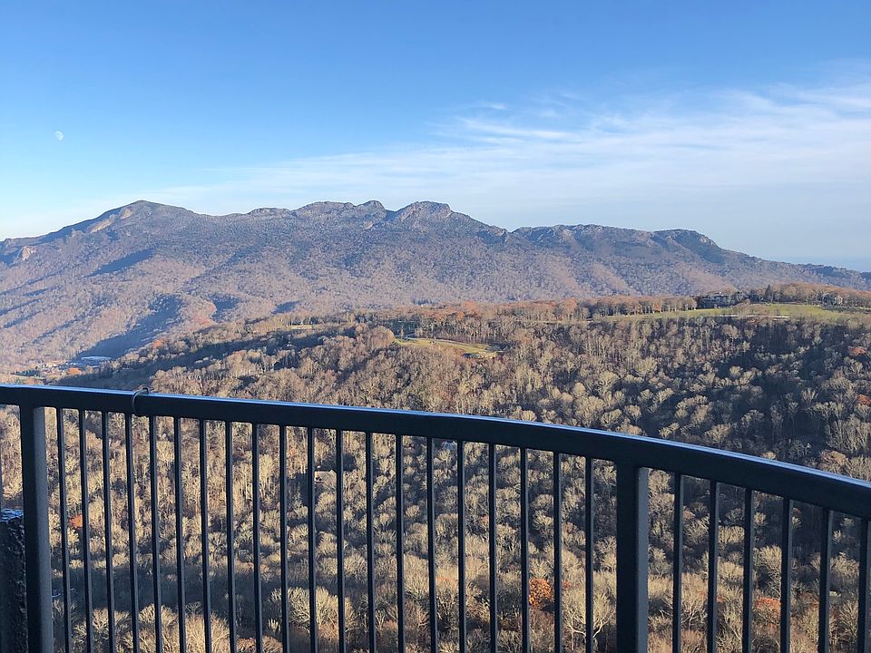 View from living room screen door to balcony.