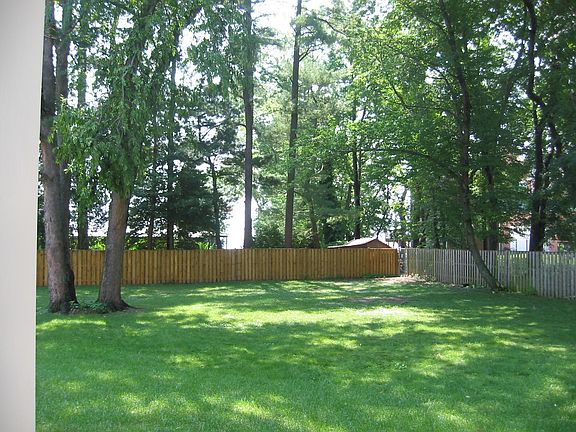 Park-like 1/2 ac. Yard