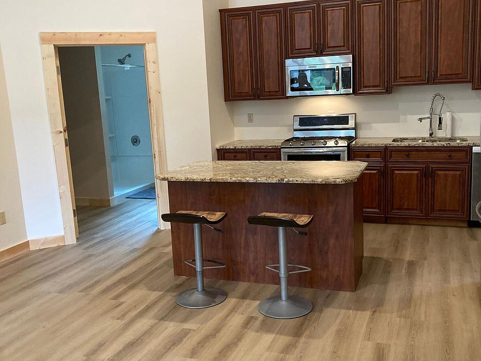 View from living area looking to bathroom/kitchen areas