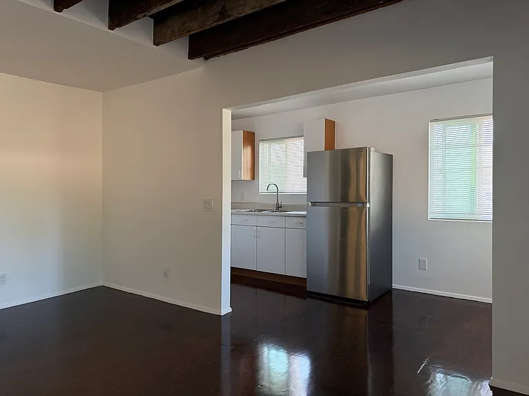 North windows offer partial views of the San Gabriel mountains.