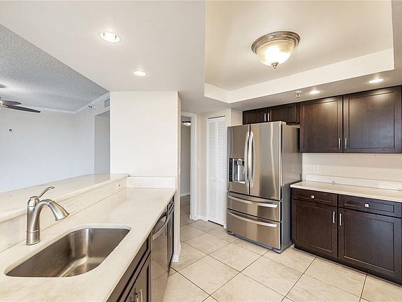 4th image of 5950 Pelican Bay Plz S APT 204