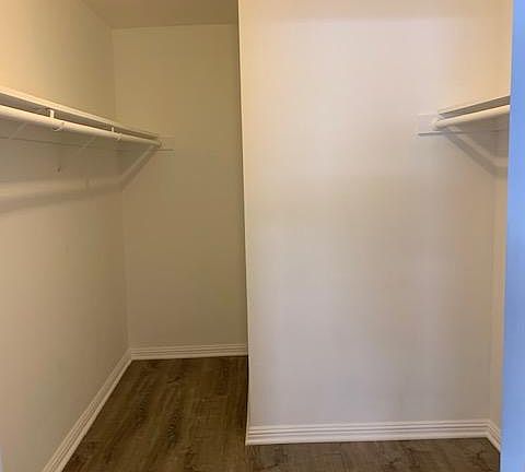 Spacious master walk-in closet with locking door