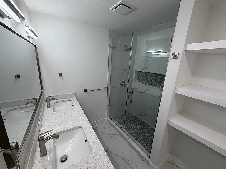 Master Bath w/ Double Sinks and Linen Shelving