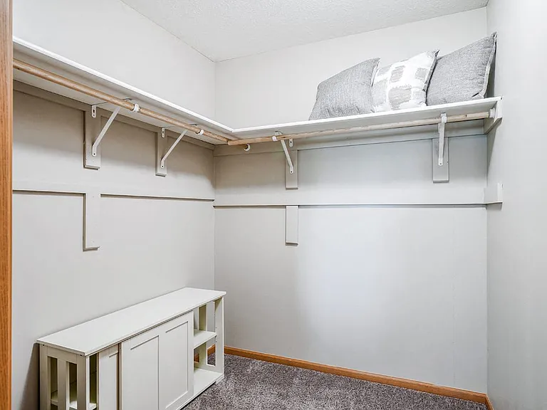 Large walk-in closets offer plenty of space to keep your wardrobe organized.